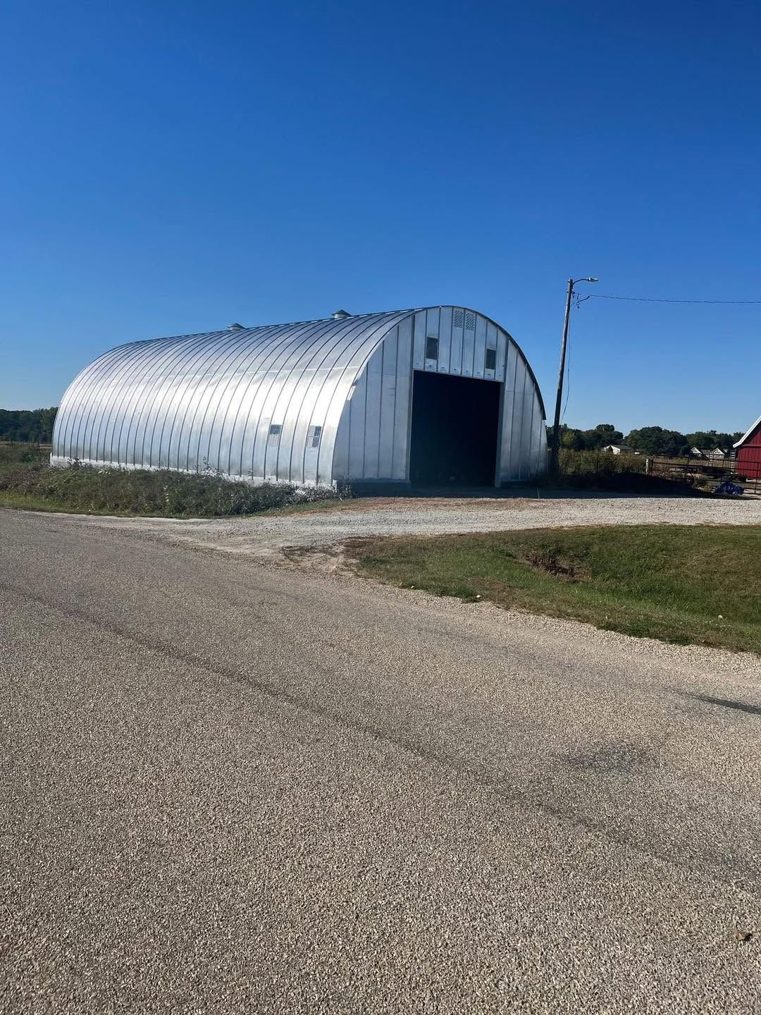 The same Quonset building coated bright silver